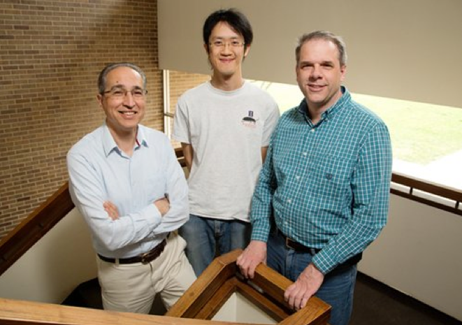University of Illinois entomology senior scientist Manfredo Seufferheld, left; Illinois Natural History Survey insect behaviorist Joseph Spencer, right; graduate student Chia-Ching Chu and their colleagues found that gut microbes helped the Western corn rootworm beetle survive in soybean fields long enough to lay its eggs.