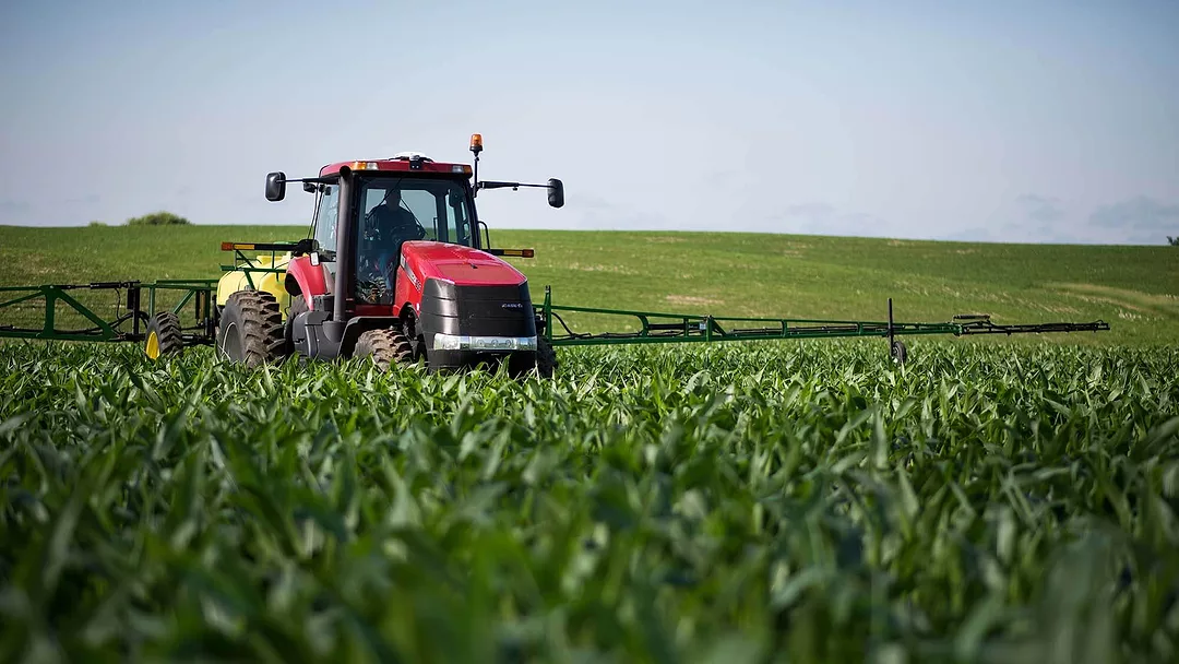 Tractor Spraying Crops.jpeg