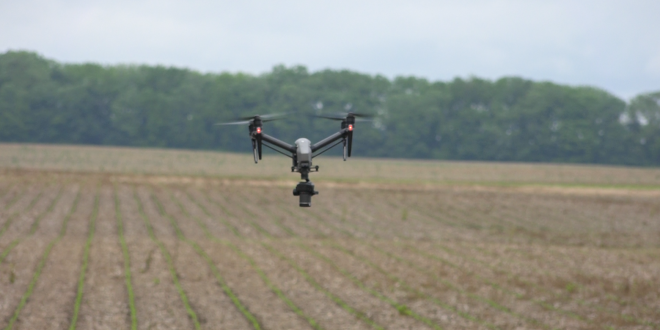 Ag-Main-Drone-in-front-of-field.png