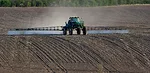 tractor-spraying-soil.png