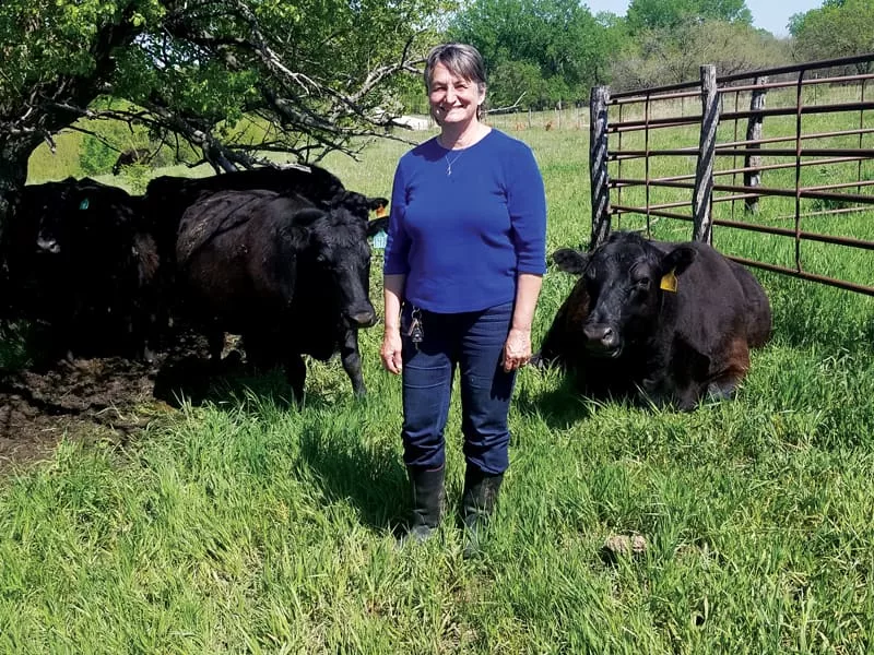 Lucinda-Stuenkel-with-cows.jpg