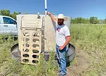 Cody-Kologi-with-a-portable-water-tank.jpg