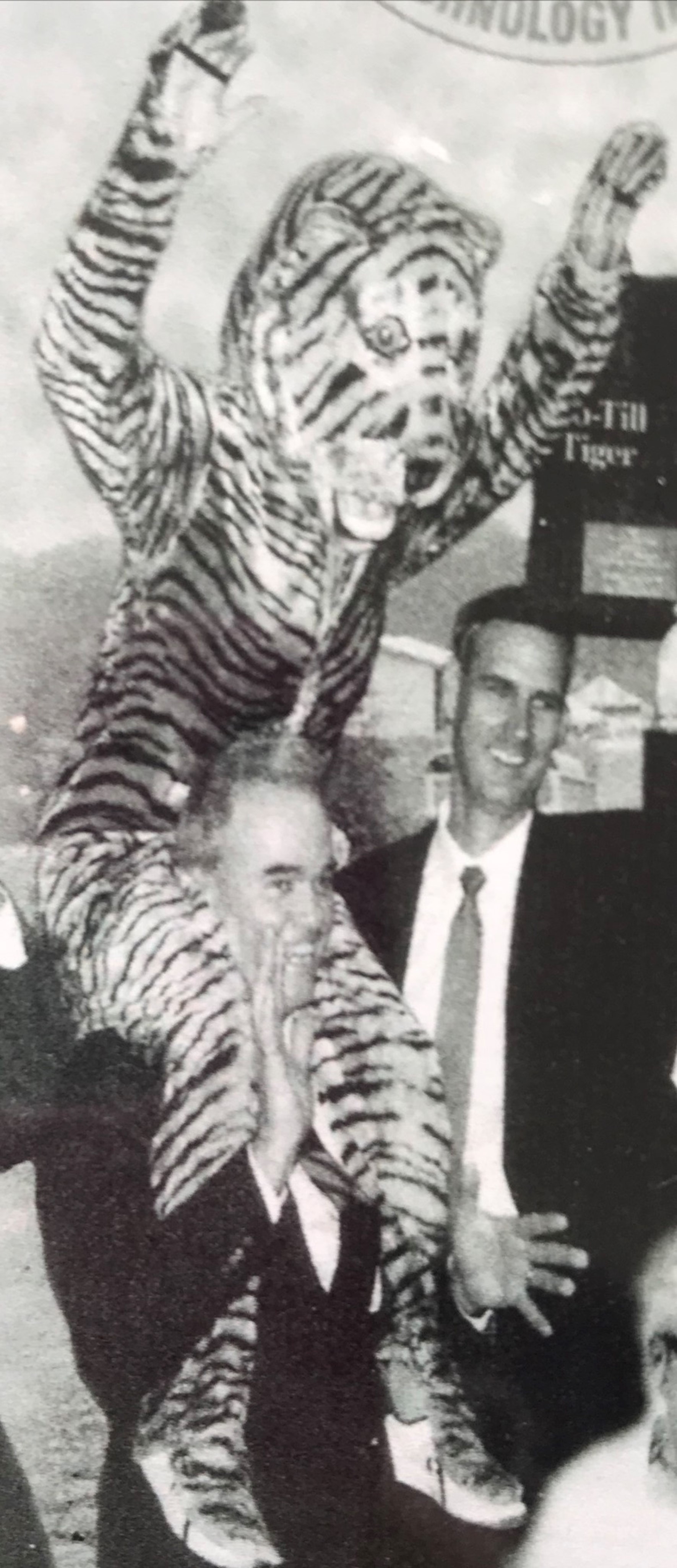 Dick Foell, with is feline-dressed wife, Chic on his shoulders in celebration of one of the “no-till tigers.”